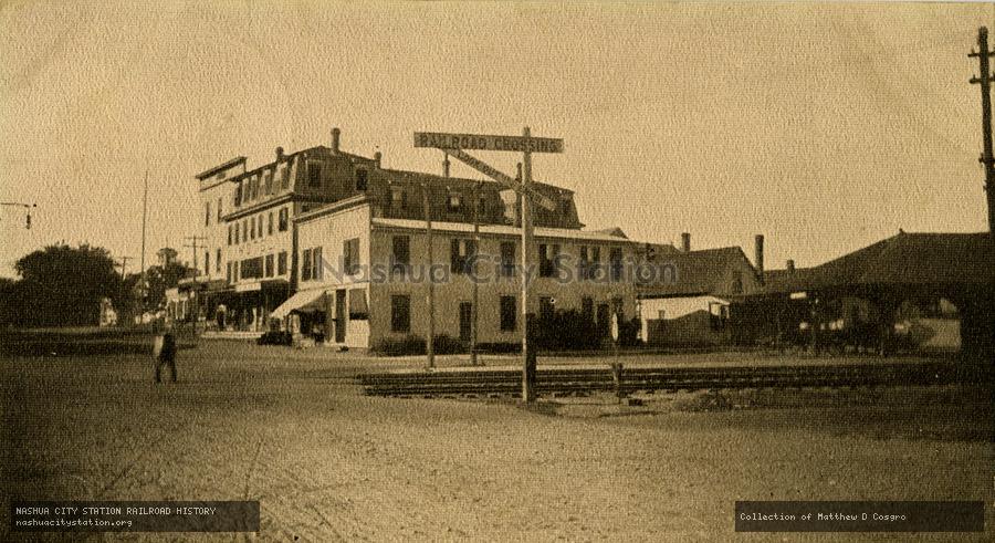 Postcard: Railroad Station and Main Street, Raymond, N.H.